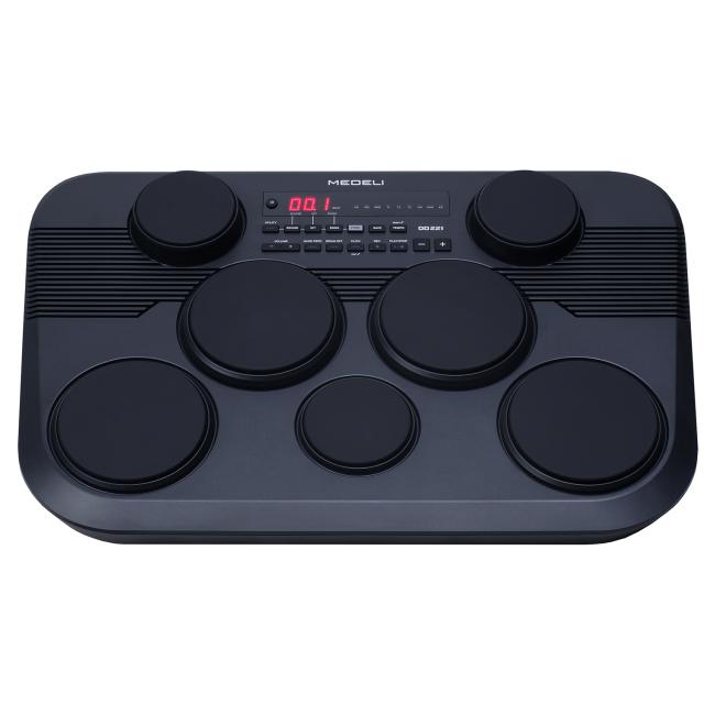 Portable drum kit with 7 touch-sensitive pads and 2 pedals