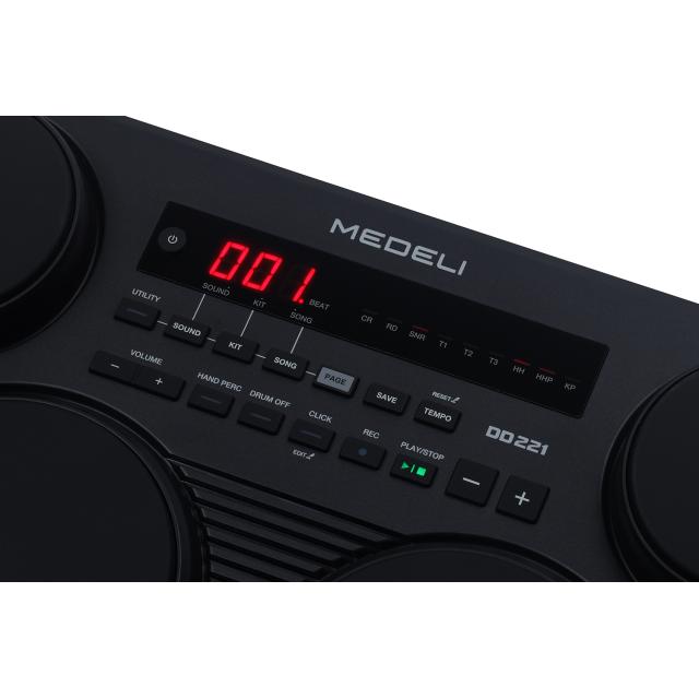 Portable drum kit with 7 touch-sensitive pads and 2 pedals