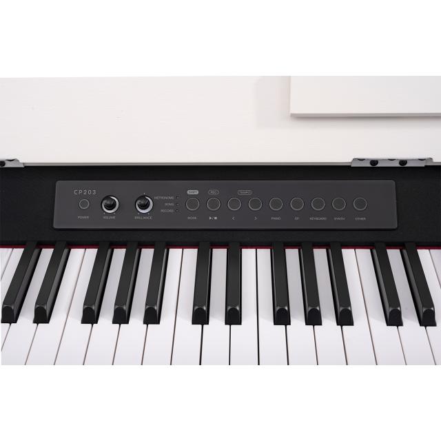 Compact digital piano with white finish