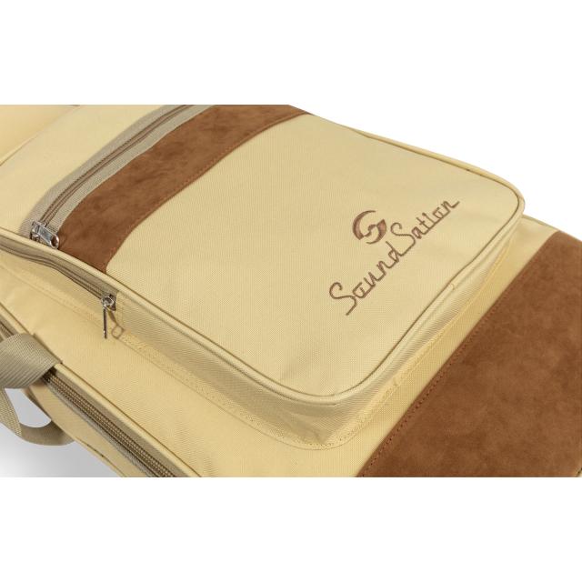 Acoustic guitar bag with suede leather inserts