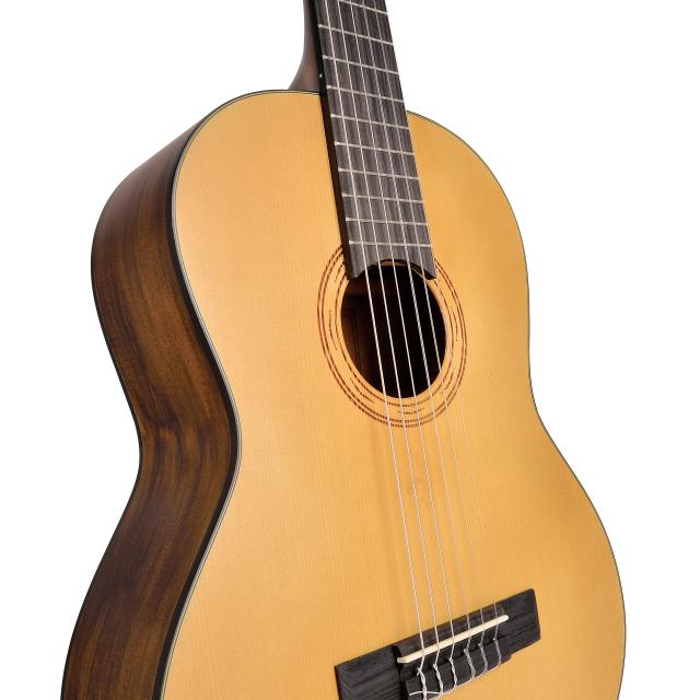 3/4 classical guitar featuring solid spruce top and engraved rosette