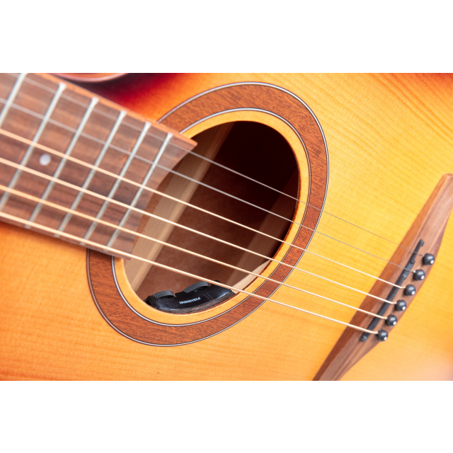 Dreadnought cutaway acoustic guitar with mahogany armrest and preamp