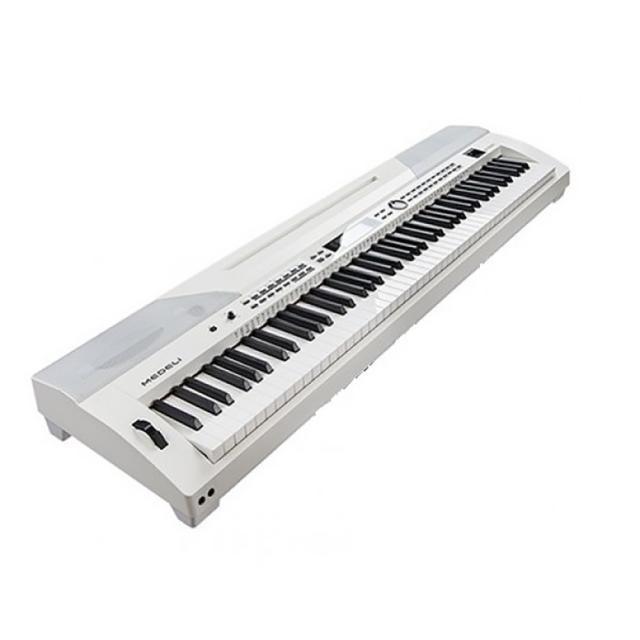 Stage Piano with 88 Keys hammer action keyboard, automatic accompaniments and white finish.